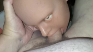 Doll giving head.