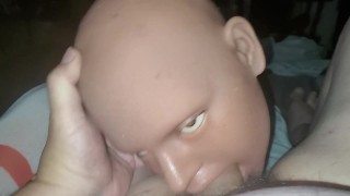 Doll giving head.