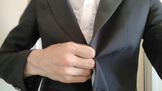 Crossdresser (light-blue bra is seen through the blouse)