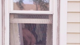 Neighbor Twink using dildo on ass and mouth in window