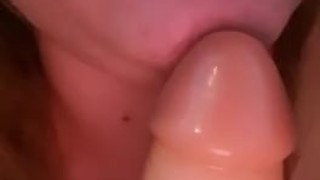 Close blowjob tease with dildo