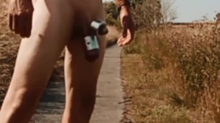 Naked on cycle path with cock and ball weights