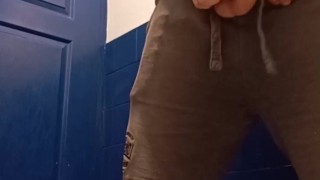 Hung jock loud piss in the gym toilet