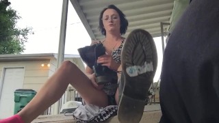 Brunette MILF puts on combat boots with dress