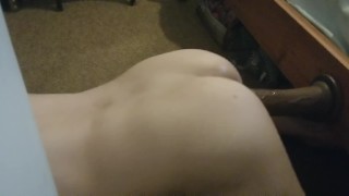 Shaved sissy twink trains on big black dildo