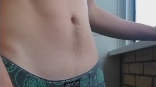 handsome guy in panties with a big standing cock spying on a neighbor