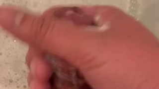 Asian boy in the bathtub