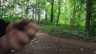 Cruising and wanking outside in a forest next to a highway