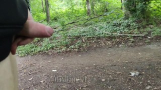 Cruising and wanking outside in a forest next to a highway