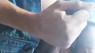 Venezuelan boy in Blue Jeans touching is balls 