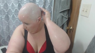 Sweet sub Cherry Savage shaving her head with a razor