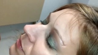 Milf gets facial in park bathroom