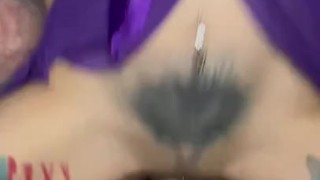 Riding a huge dildo