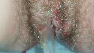 Huge special pissing menstrual cocktail from hairy pussy close up - Angel Fowler 