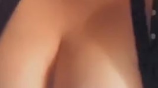 Smoking outside and playing with my big tits