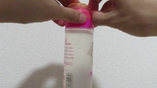 Remove the condom on the bottle of sexual lubricant.