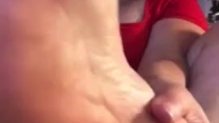 Chubby MILF plays with her spit and toes