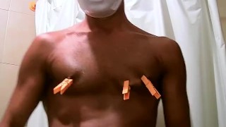 clothespins on nipples and cock