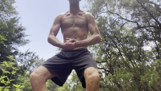 Cam Crest flexes is outside in public.