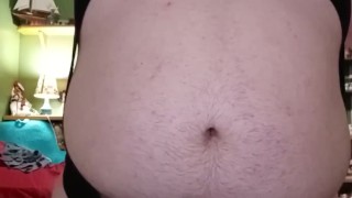Fat guy wearing bodysuit strips and cums