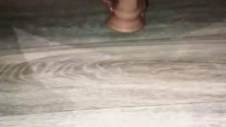 Plays with dildo in torn tights