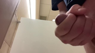 Cumshot in public bathroom