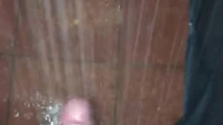 Playing with curved cucumber (dick) in shower 