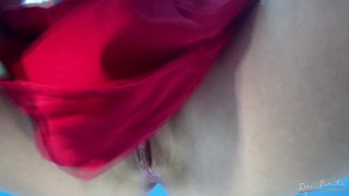 Pissing at a party close-up in a red dress without panties close-up