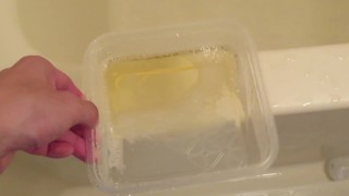 Pissing into the plastic case.