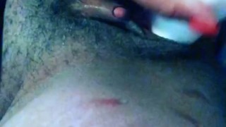 Horny ebony squirts on dildo