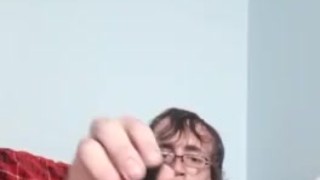 Twink masturbates big dick with butt plug