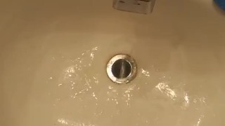 pissing all over a sub bitch hole