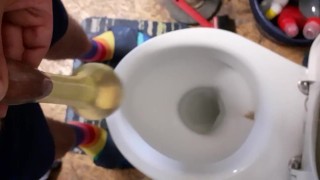 Having fun pissing in condom
