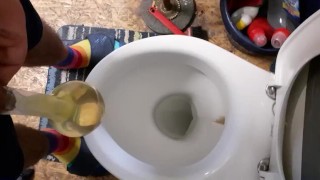 Having fun pissing in condom
