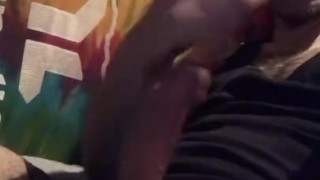 Stroking curved hard throbbing cock