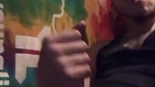 Stroking curved hard throbbing cock