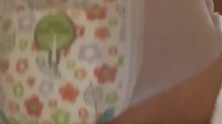 Diaper boy rides K9 dildo in a goodnights diaper