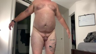 Dad Bod doing squats lunges jumping jacks and stretching