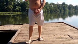 Hairy Ginger playing with dick at the river and on the dock