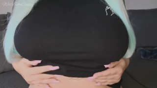 White girl massages her big boobs with oil