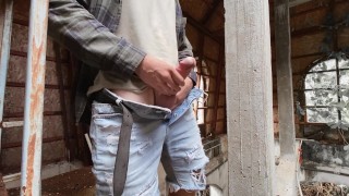 Handsome Guy Jerks Off A Huge Cock In The Factory