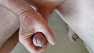 Dad is wanking his hard circumcised cock