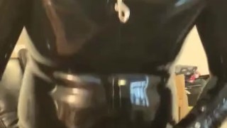 Full rubber gimp enjoys dildo gag