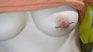 2 inch nails through my nipples very painful 