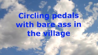 Circling pedals with bare ass in the village