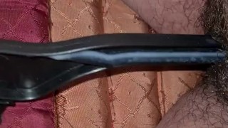 Fucking a coat hanger with cum 