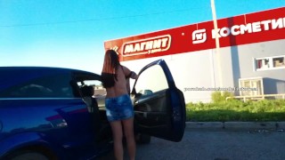 changing in a parking lot, caught