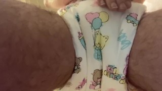 Diaper boy pees in a cute abdl diaper 