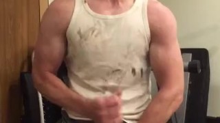 Muscular guy flexing in a dirty wifebeater and shooting cum!