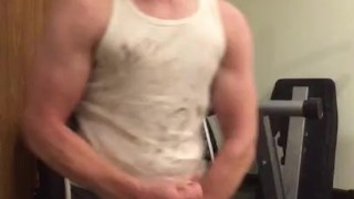 Muscular guy flexing in a dirty wifebeater and shooting cum!